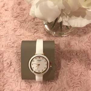 NWT KATE SPADE White watch with a silicone strap.
